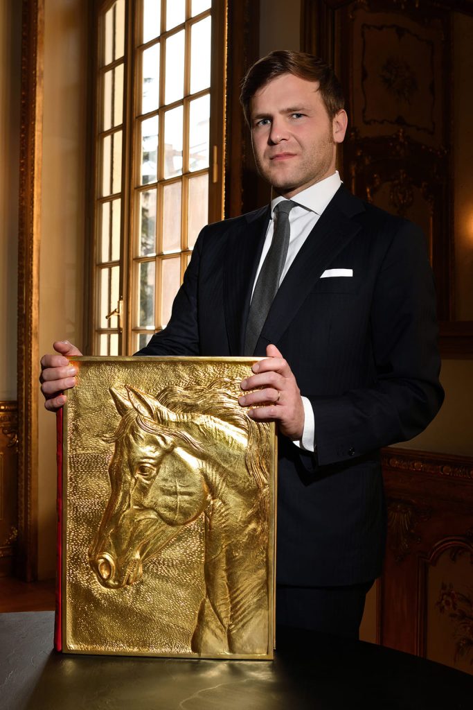 Salvatore Giorgio Dino with The Golden Horses bespoke book with gold cover