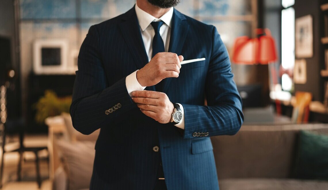 businessman adjusting his sleeves