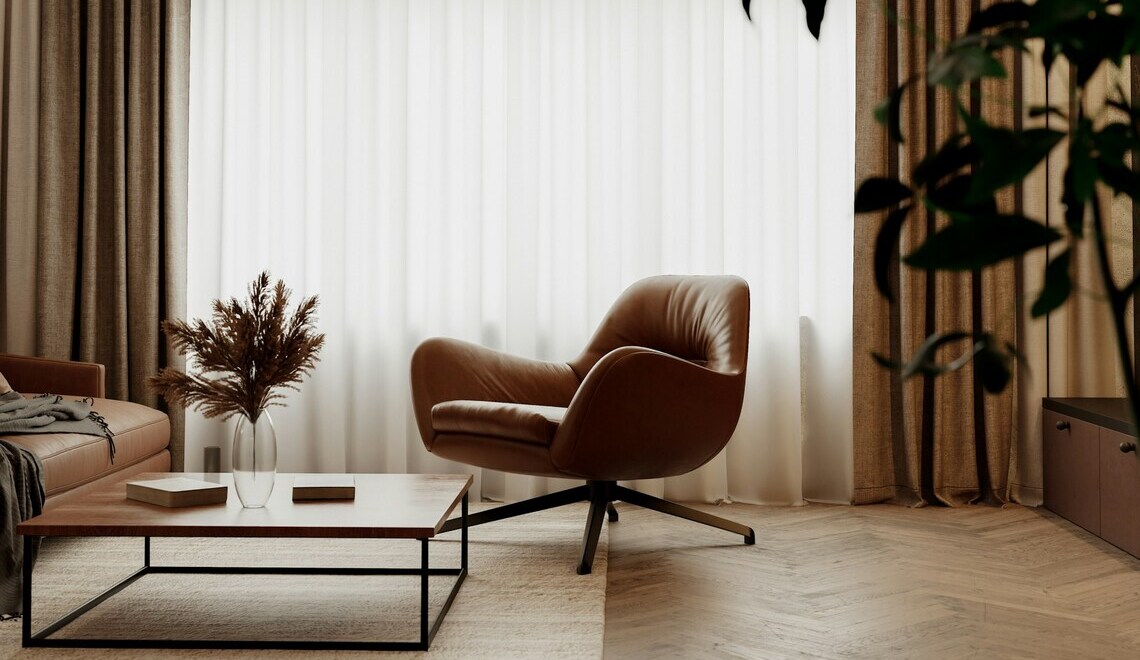 soggiorno moderno con poltrona marrone e tavolino