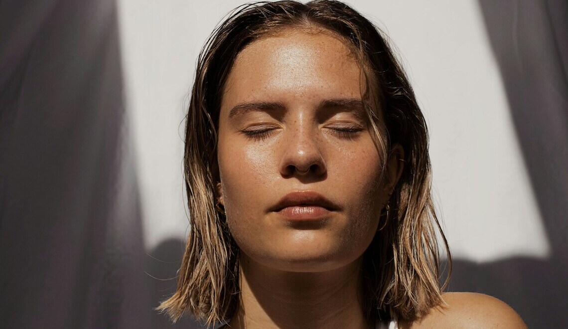 woman with her eyes closed