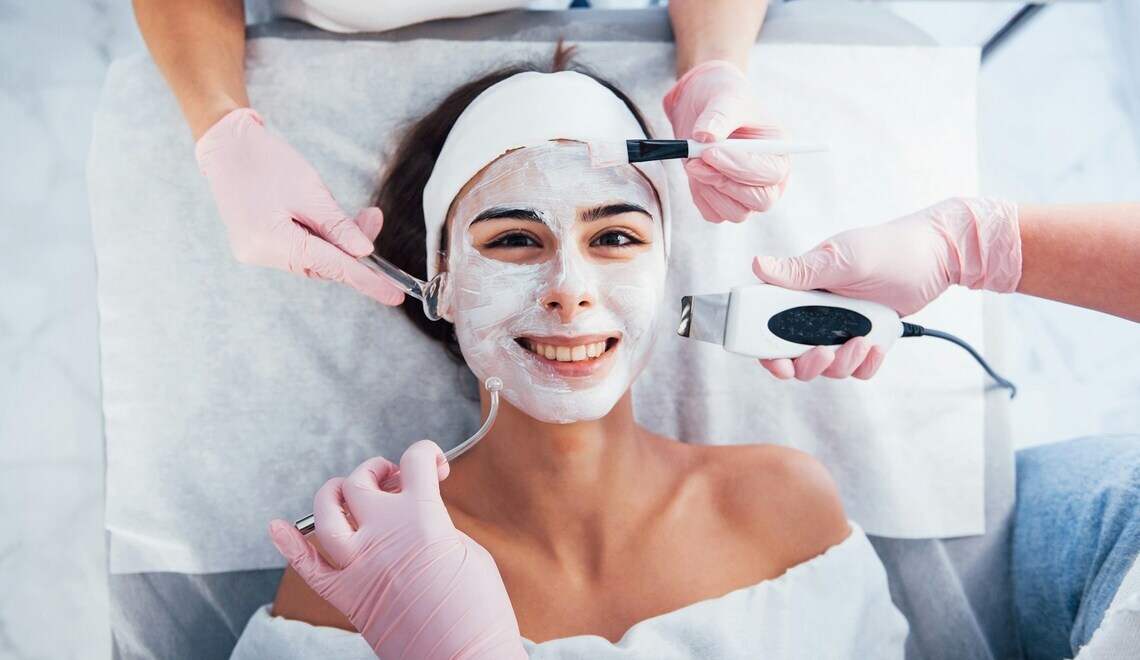 woman receiving different facial treatments