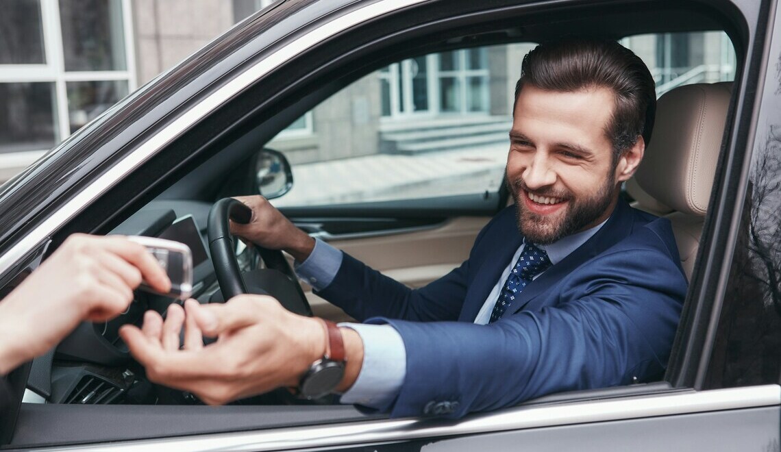 Man receiving car keys