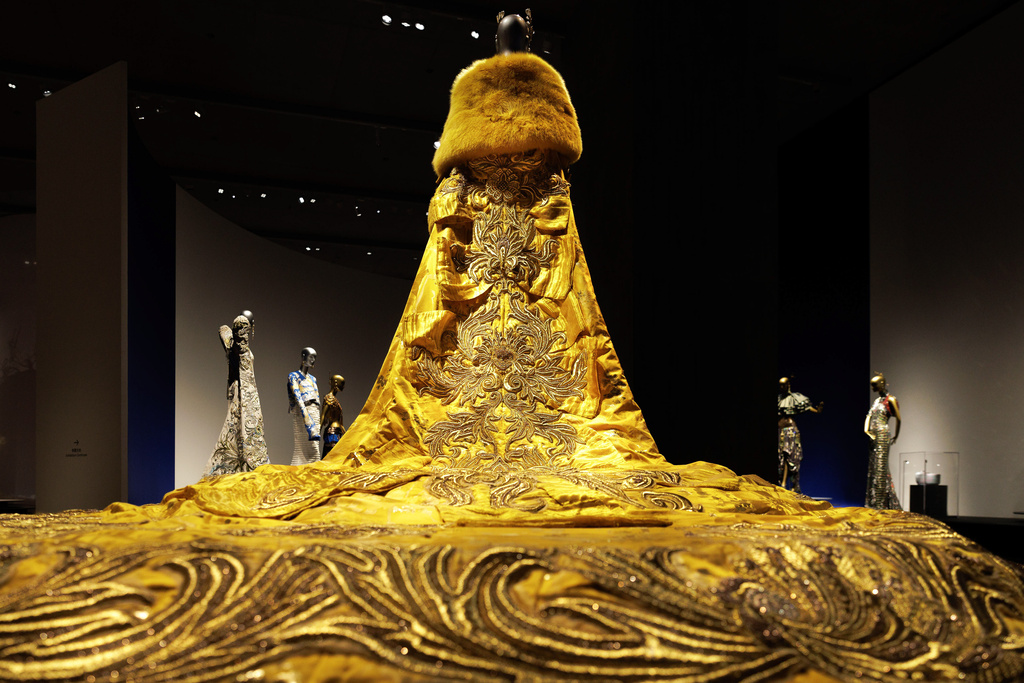 fashion is art - Yellow gown worn by Rihanna at the 2015 Met Gala, seen at Guo Pei's exhibition at M+ Gallery in Hong Kong. The exhibition will last until April 2025.
Guo Pei is the renowned Chinese haute couture designer celebrated for her intricate, opulent designs that seamlessly blend traditional Chinese craftsmanship with modern fashion. Known for her breathtakingly detailed creations, including the iconic yellow gown worn by Rihanna at the 2015 Met Gala, Guo Pei became the first Asian member of the Chambre Syndicale de la Haute Couture in 2010, solidifying her place on the global fashion stage. (Photo by May James for Zolima/SOPA Images/LightRocket via Getty Images)