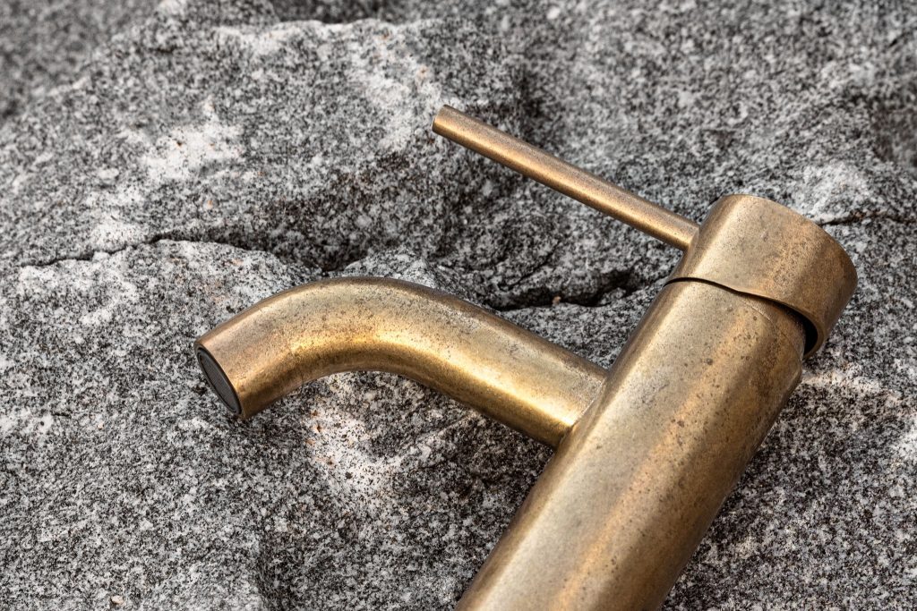 aged brass faucet