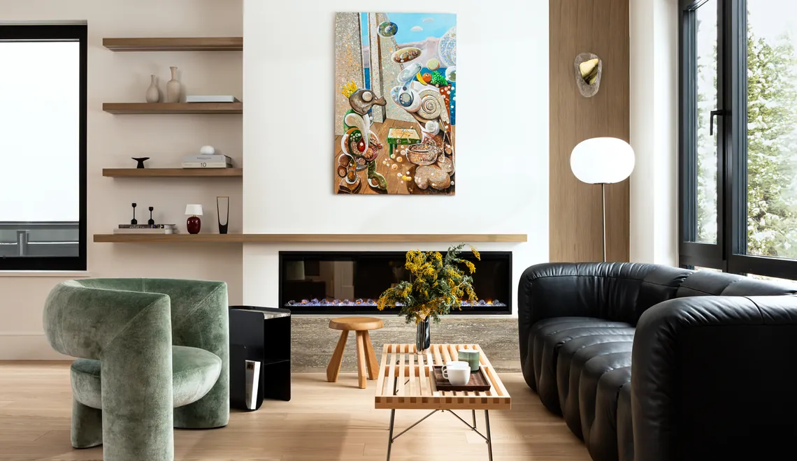 sha wang atelier fen living room with sage green chair and black leather sofa vancouver