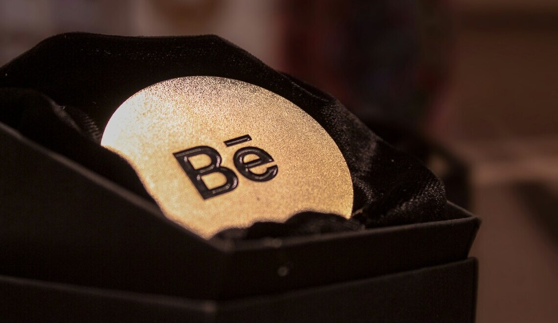 A personalized engraved keepsake coin resting in an open gift box