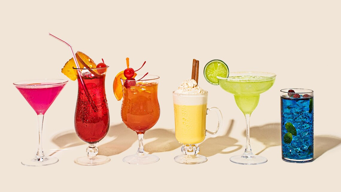 a group of different colorful drinks